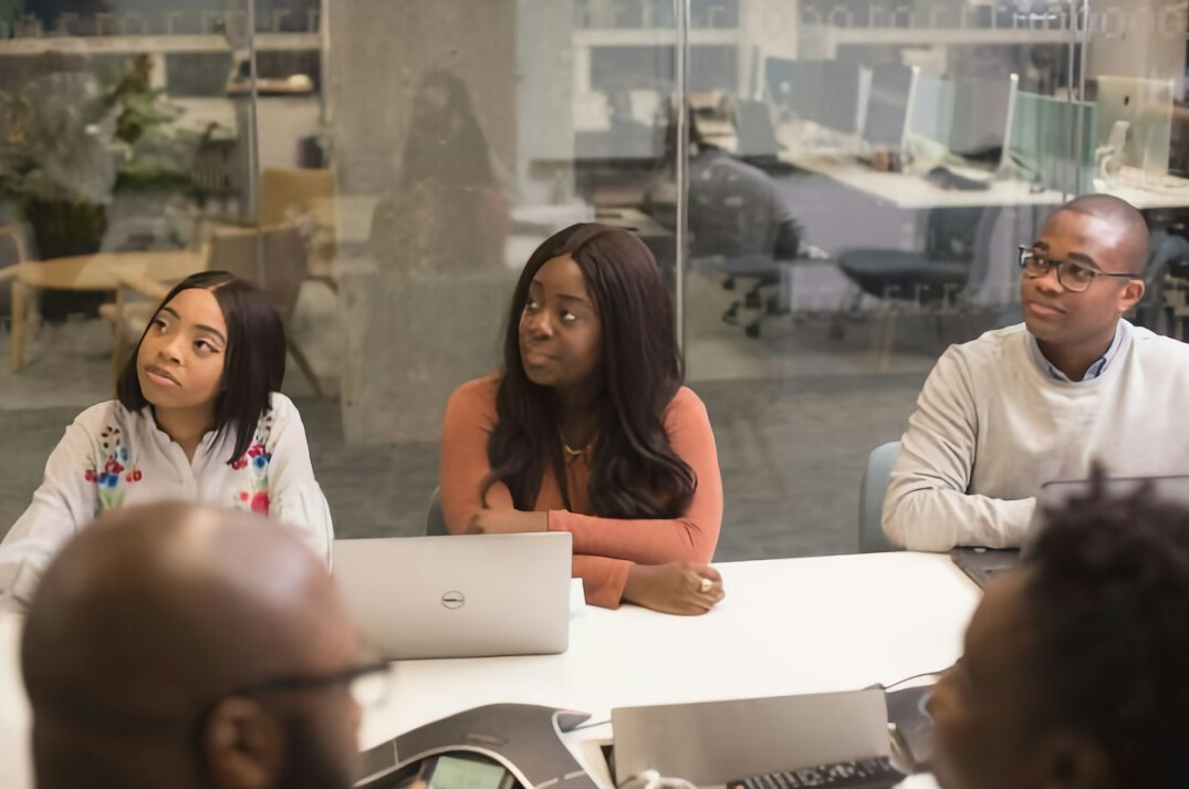 doctor leading team meeting