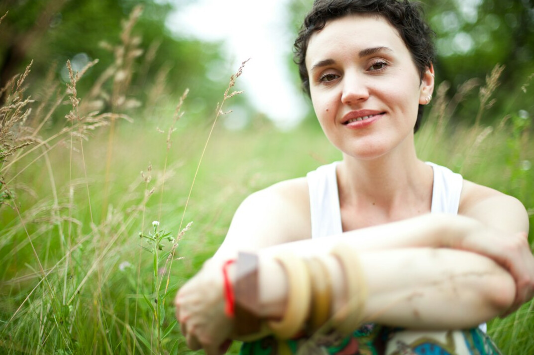 Portrait of a smiling woman program lead in her forties